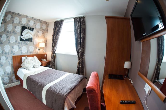 Imagen de la habitación del Hotel Thomas James. Foto 7