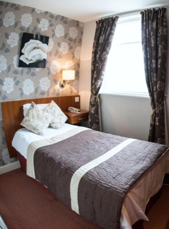Imagen de la habitación del Hotel Thomas James. Foto 11
