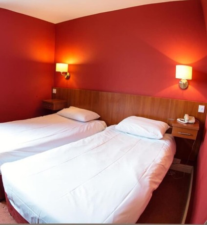 Imagen de la habitación del Hotel Thomas James. Foto 12