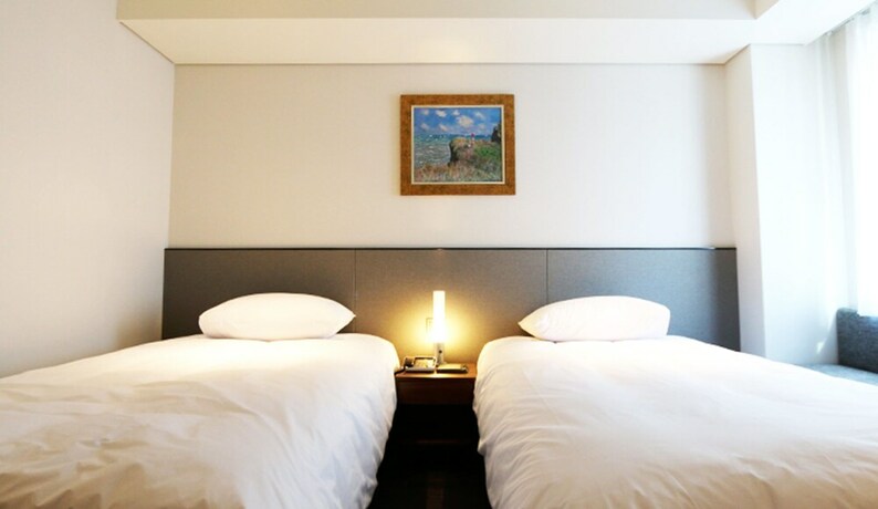 Imagen de la habitación del Hotel Thomas Myeongdong. Foto 12