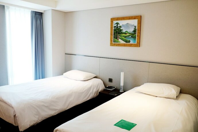 Imagen de la habitación del Hotel Thomas Myeongdong. Foto 16