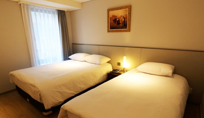 Imagen de la habitación del Hotel Thomas Myeongdong. Foto 22
