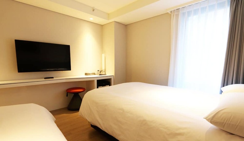 Imagen de la habitación del Hotel Thomas Myeongdong. Foto 24