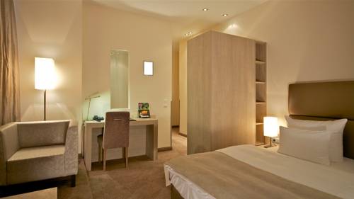 Imagen de la habitación del Hotel Thomas Spa and Lifestyle. Foto 12