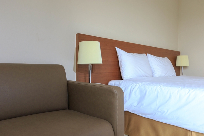 Imagen de la habitación del Hotel Thomson Huamark. Foto 3