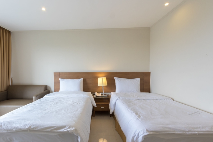 Imagen de la habitación del Hotel Thomson Huamark. Foto 6