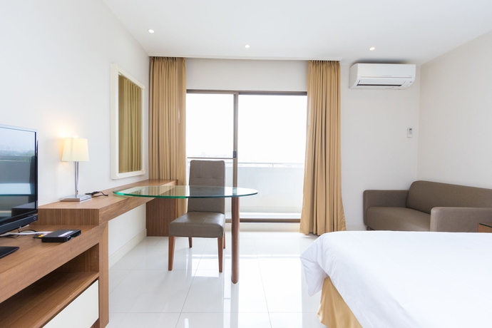 Imagen de la habitación del Hotel Thomson Huamark. Foto 9