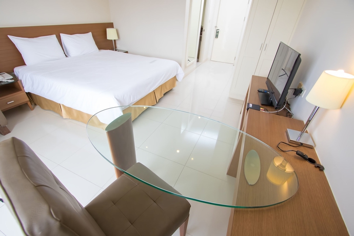 Imagen de la habitación del Hotel Thomson Huamark. Foto 10