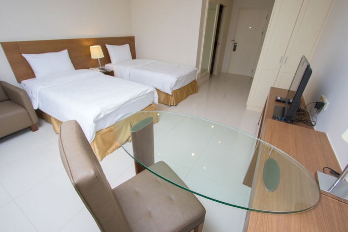Imagen de la habitación del Hotel Thomson Huamark. Foto 14