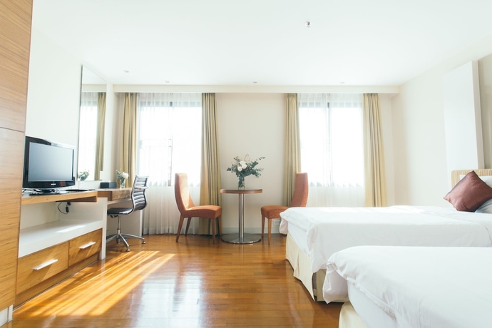 Imagen de la habitación del Hotel Thomson Residence. Foto 5