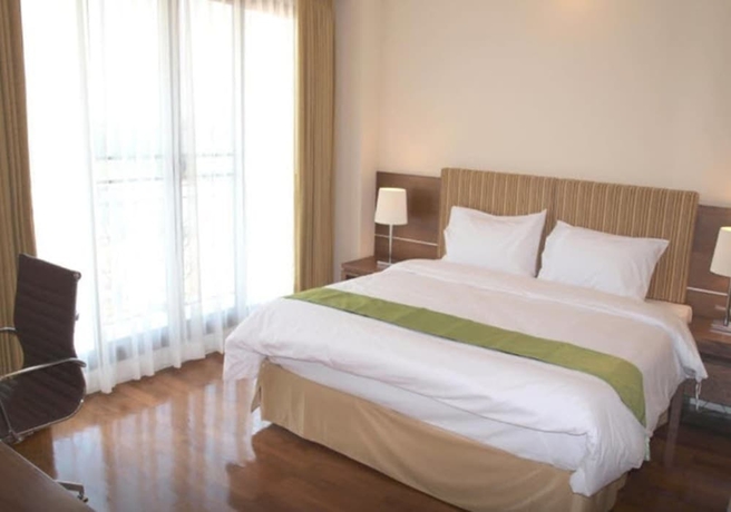 Imagen de la habitación del Hotel Thomson Residence. Foto 6