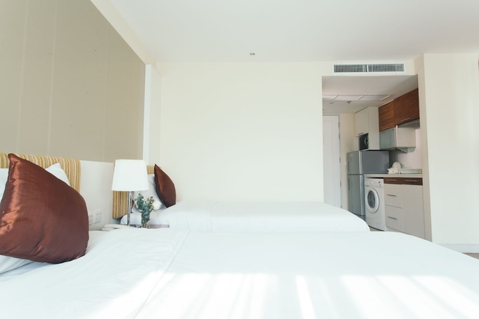 Imagen de la habitación del Hotel Thomson Residence. Foto 9