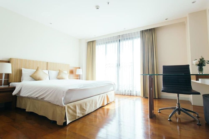 Imagen de la habitación del Hotel Thomson Residence. Foto 10