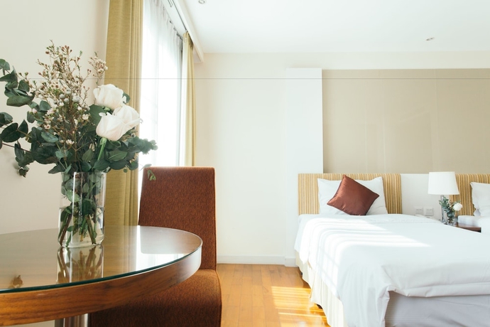 Imagen de la habitación del Hotel Thomson Residence. Foto 12