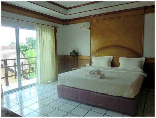 Imagen de la habitación del Hotel Thong Paeka. Foto 4