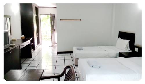 Imagen de la habitación del Hotel Thong Paeka. Foto 13