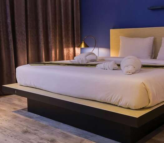 Imagen de la habitación del Hotel Thongmanee Hotel. Foto 2