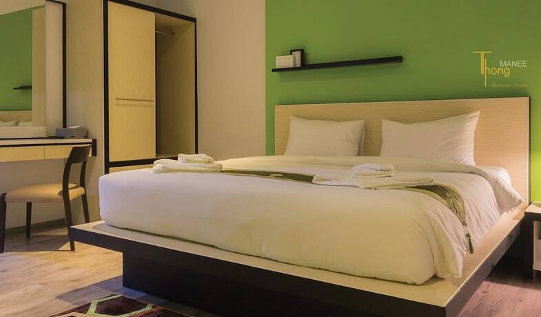 Imagen de la habitación del Hotel Thongmanee Hotel. Foto 14