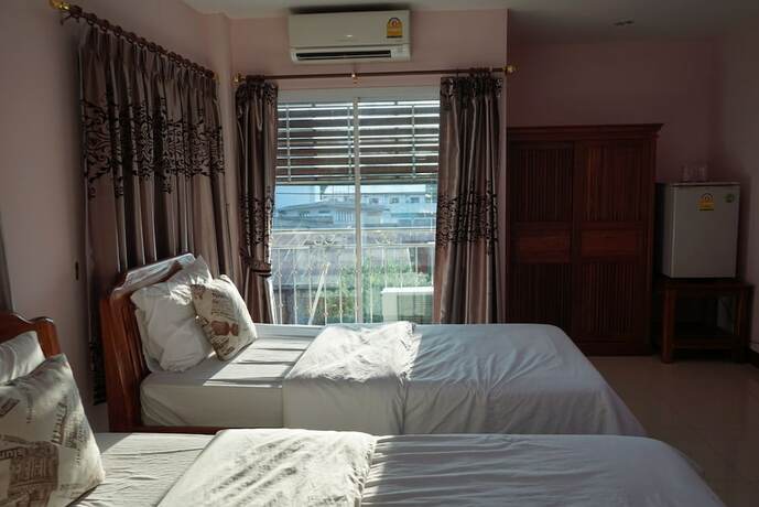 Imagen de la habitación del Hotel Thonkla Happyhome. Foto 17