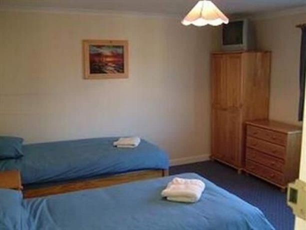 Imagen de la habitación del Hotel Thorne Central Guest House. Foto 10