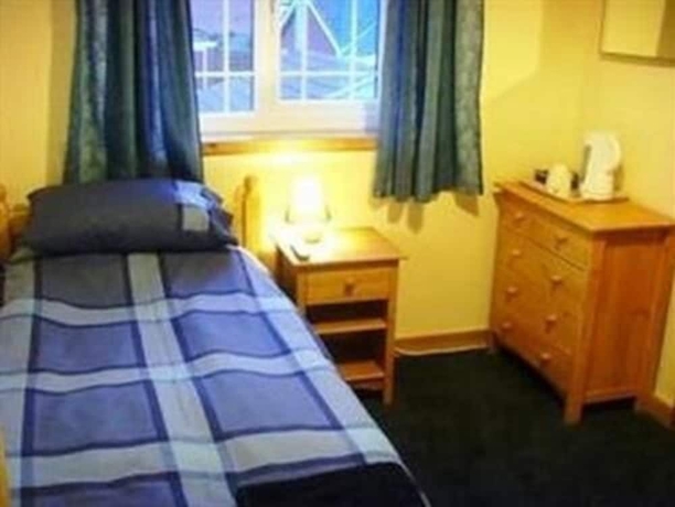 Imagen de la habitación del Hotel Thorne Central Guest House. Foto 11