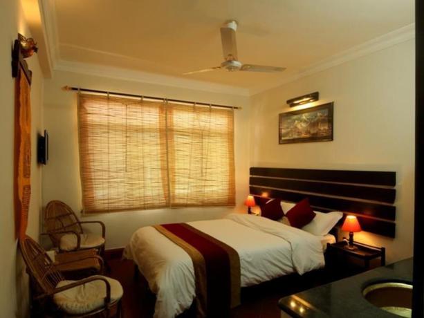 Imagen de la habitación del Hotel Thorong Peak. Foto 9