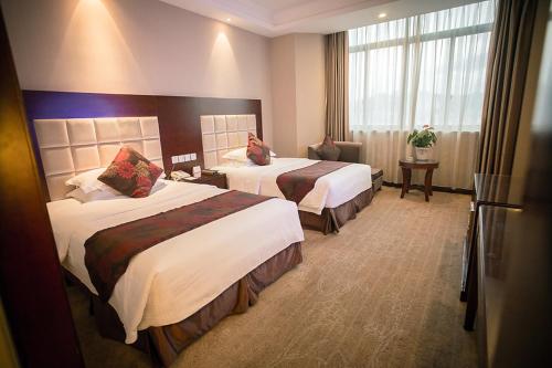 Imagen de la habitación del Hotel Thousand Lake Garden. Foto 8