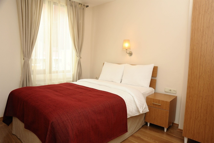 Imagen de la habitación del Hotel Three Apples Residence. Foto 3