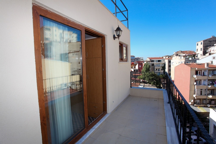 Imagen de la habitación del Hotel Three Apples Suites and. Foto 3