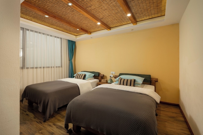Imagen de la habitación del Hotel Three Colours Yunhe Erhai. Foto 10
