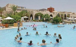 Imagen de la piscina del Hotel Three Corners El-Wekala Golf Resort. Foto 7