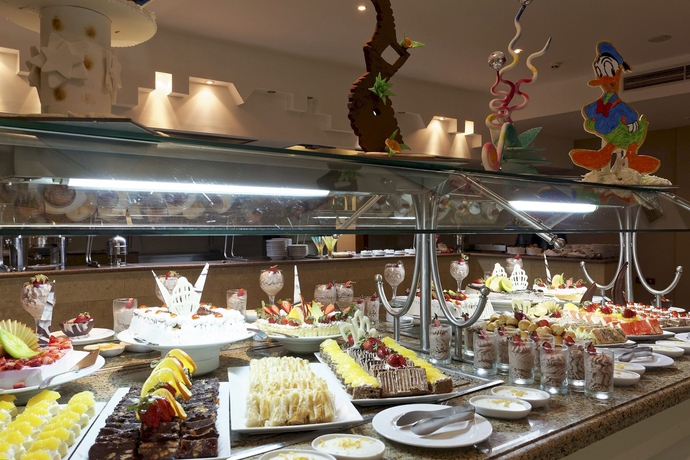 Imagen del bar/restaurante del Hotel Three Corners Equinox Beach Resort. Foto 3