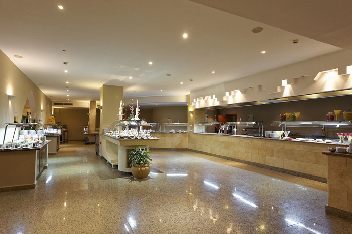 Imagen del bar/restaurante del Hotel Three Corners Equinox Beach Resort. Foto 4