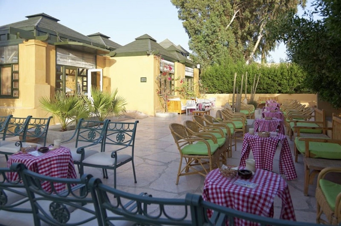 Imagen del bar/restaurante del Hotel Three Corners Rihana Inn. Foto 2