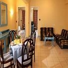 Imagen del bar/restaurante del Hotel Three Corners Triton Empire Inn. Foto 2