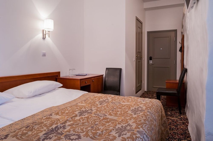 Imagen de la habitación del Hotel Three Crowns Residents. Foto 8