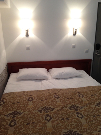 Imagen de la habitación del Hotel Three Crowns Residents. Foto 11