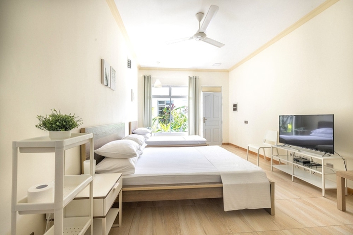 Imagen de la habitación del Hotel Three Hearts Guesthouse. Foto 15