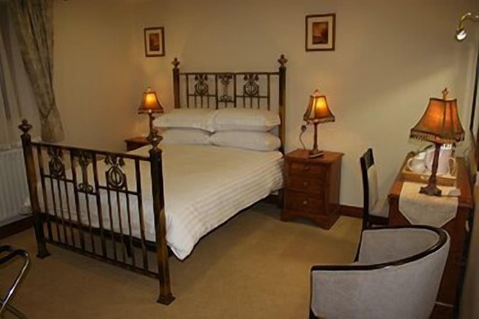 Imagen de la habitación del Hotel Three Horseshoes Country Inn and Spa. Foto 19