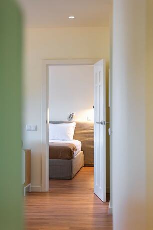 Imagen de la habitación del Hotel Three House. Foto 13