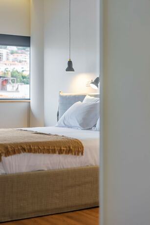 Imagen de la habitación del Hotel Three House. Foto 15