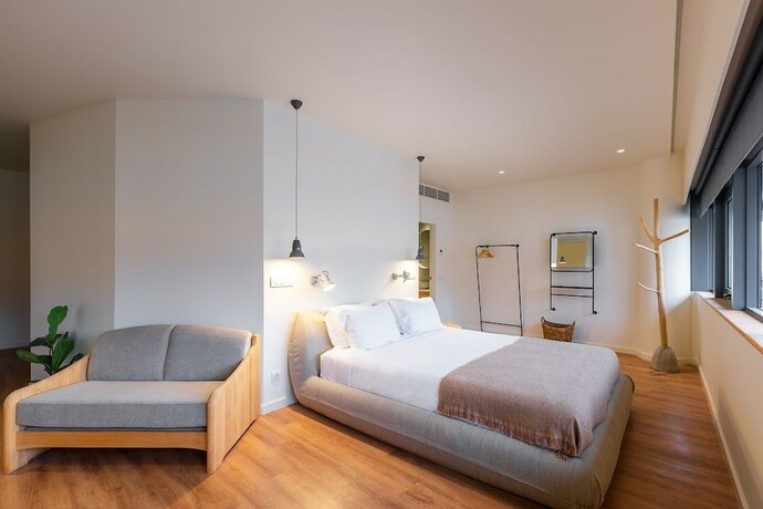 Imagen de la habitación del Hotel Three House. Foto 19