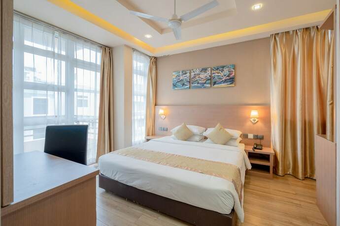 Imagen general del Hotel Three Inn. Foto 11