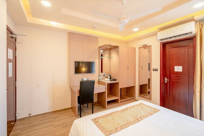 Imagen de la habitación del Hotel Three Inn. Foto 15