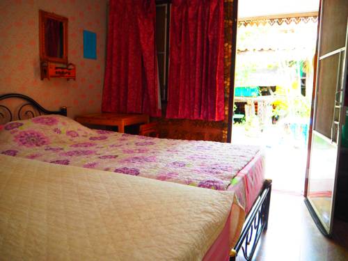 Imagen de la habitación del Hotel Three J Guesthouse. Foto 5