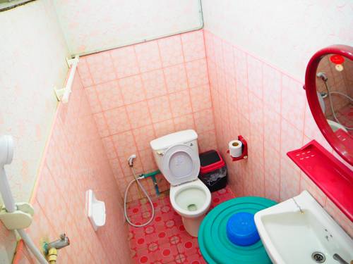 Imagen de la habitación del Hotel Three J Guesthouse. Foto 6