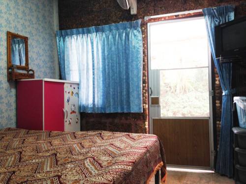 Imagen de la habitación del Hotel Three J Guesthouse. Foto 9