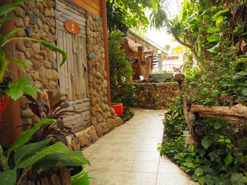 Imagen de la habitación del Hotel Three J Guesthouse. Foto 10