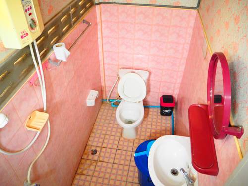 Imagen de la habitación del Hotel Three J Guesthouse. Foto 13