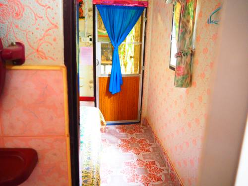 Imagen de la habitación del Hotel Three J Guesthouse. Foto 14